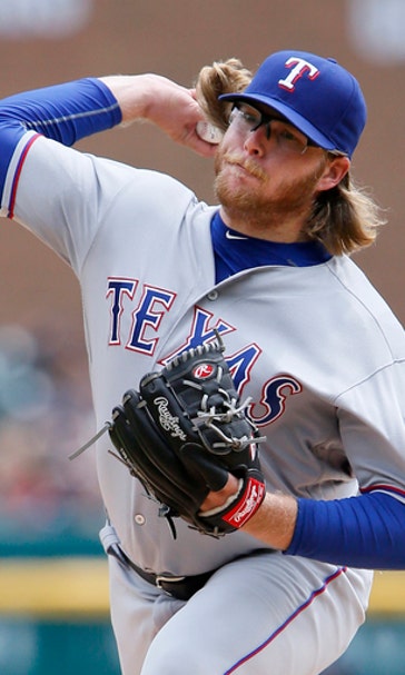 Rangers put RHP Griffin on 15-day DL, recall Claudio